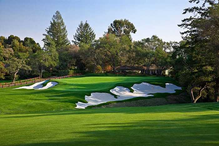 Dr. Alister MacKenzie considered the par-4 16th hole his favorite at Pasatiempo Golf Club, calling it "the best two-shot hole I know." The hole displays a false front tongue of green that was present in several of Augusta National's original holes, and the bold greenside sand bunker is reminiscent of the current bunker at Augusta's 10th.