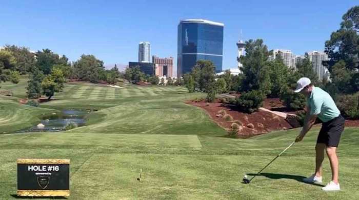 Brayden McNabb tees off at the Wynn Golf Club.