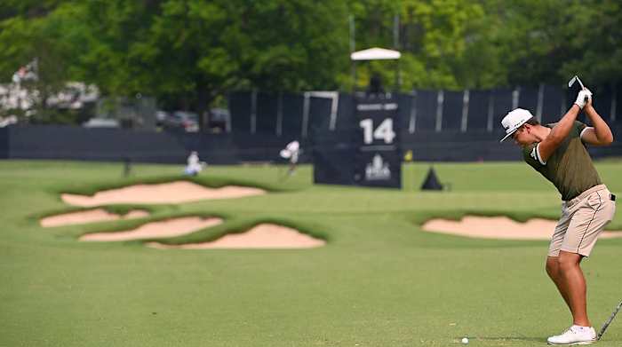 Garrick Higgo plays a shot to the 14th hole during practice for the 2022 PGA Championship at Southern Hills.