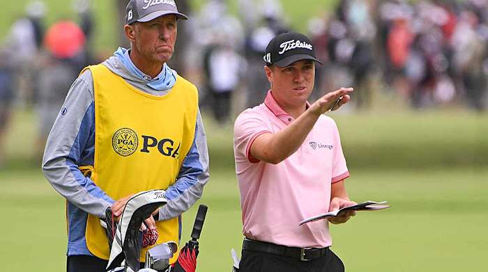Justin Thomas and caddy Bones Mackay in the final round.