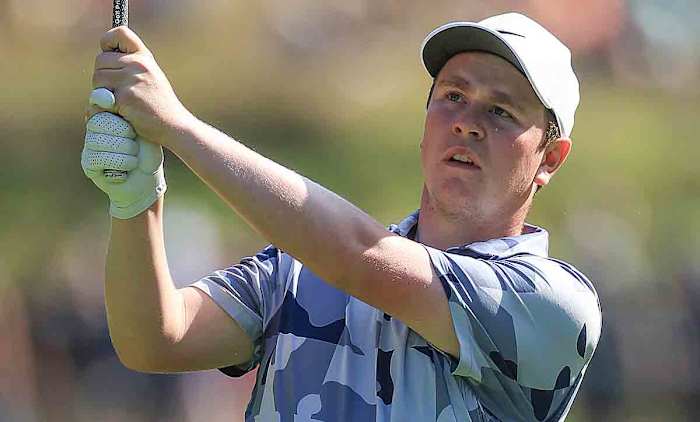 Robert MacIntyre of Scotland plays his second shot on the sixth hole during the second round of the 2023 BMW PGA Championship at Wentworth Golf Club.