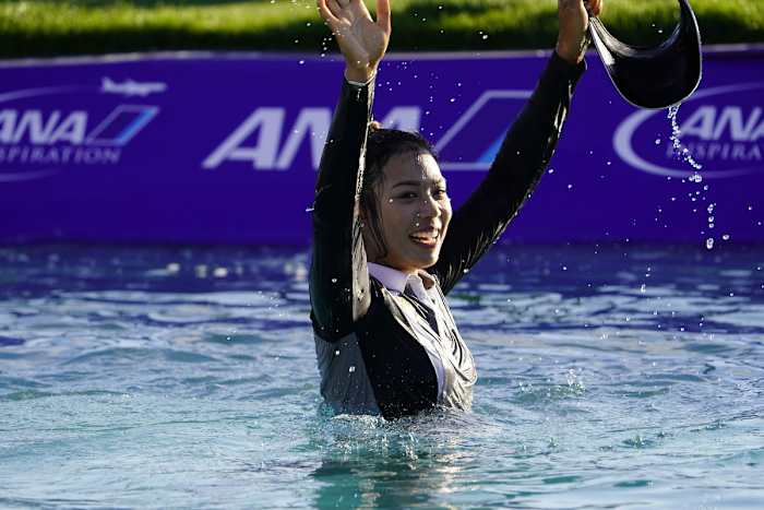 Patty Tavatanakit celebrates in Poppie's Pond after winning the 2021 ANA Inspiration.