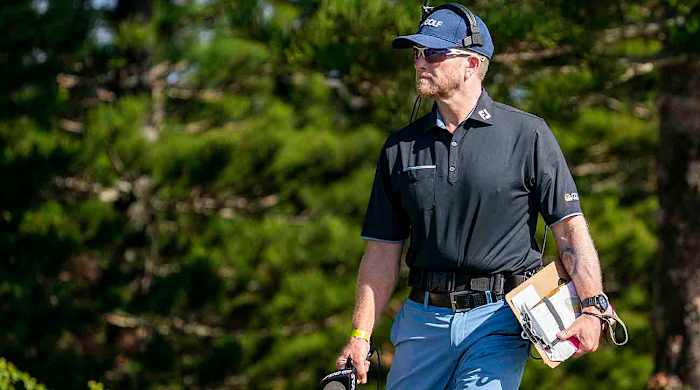 Golf Channel on-course reporter John Wood on the second hole during the final round of the 2021 Sentry Tournament of Champions at Kapalua Resort.