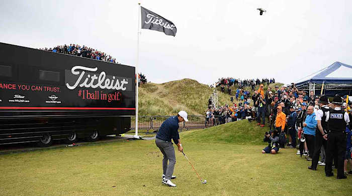 Jordan Spieth plays from the driving range alongside the 13th hole during the final round of the 2017 British Open.