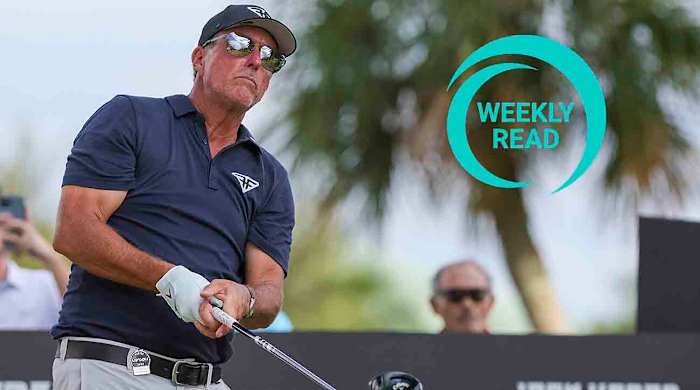 Phil Mickelson plays his shot from the 14th tee during the first round of the 2023 LIV Golf Miami team championship at Doral, along with the SI Golf Weekly Read logo.