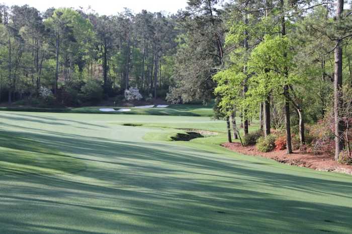 The view from near the green at the 13th hole, looking back toward the tee and the 12th green at Augusta (Ga.) National Golf Club, site of the Masters Tournament