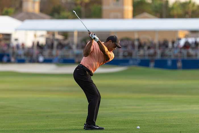 Tiger Woods hits a shot on the 18th hole at the 2021 PNC Championship.