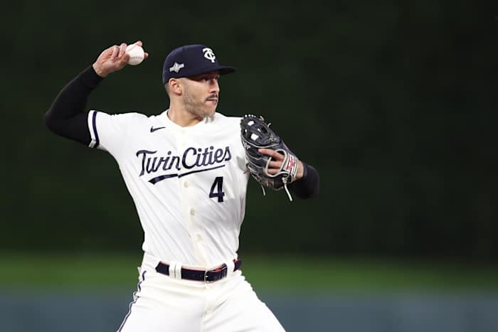 Carlos Correa fields a ground ball