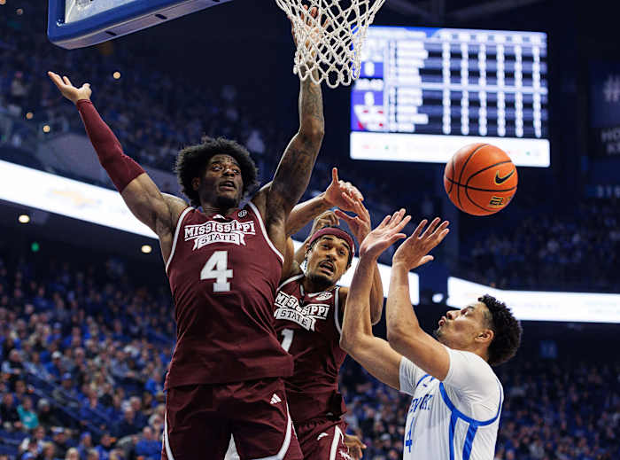 Jan 17, 2024; Lexington, Kentucky, USA; Mississippi State Bulldogs forwards Cameron Matthews (4) and Tolu Smith (1) go after a rebound against Kentucky Wildcats forward Tre Mitchell (4) during the first half at Rupp Arena at Central Bank Center. Mandatory Credit: Jordan Prather-USA TODAY Sports