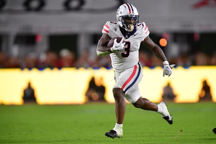 Oct 7, 2023; Los Angeles, California, USA; Arizona Wildcats running back Jonah Coleman (3) runs the ball against the Southern California Trojans during the second half at Los Angeles Memorial Coliseum. Mandatory Credit: Gary A. Vasquez-USA TODAY Sports