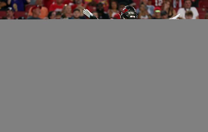 Tampa Bay Buccaneers safety Kaevon Merriweather (26) break up Baltimore Ravens tight end Charlie Kolar (88) catch as Tampa Bay Buccaneers cornerback Zyon McCollum (27) reacts during the second quarter at Raymond James Stadium. Mandatory Credit: Kim Klement Neitzel-USA TODAY Sports