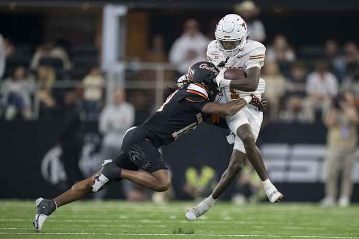 Dec 2, 2023; Arlington, TX, USA; Oklahoma State Cowboys cornerback Kale Smith (10) and Texas Longhorns wide receiver Xavier Worthy (1) in action during the game between the Texas Longhorns and the Oklahoma State Cowboys at AT&T Stadium. Mandatory Credit: Jerome Miron-USA TODAY Sports