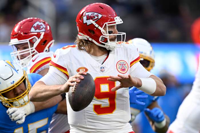Kansas City Chiefs quarterback Blaine Gabbert (9) throws a pass against the Los Angeles Chargers during the first half at SoFi Stadium.