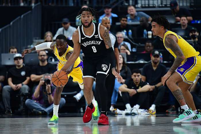 Los Angeles Lakers guard D'Moi Hodge (55) steals the ball from Brooklyn Nets forward Trendon Watford (9) during the second half at T-Mobile Arena.