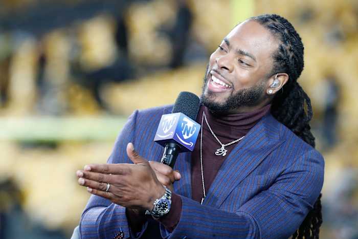 Dec 7, 2023; Pittsburgh, Pennsylvania, USA; Amazon Prime Video Thursday Night Football analyst Richard Sherman performs the pre-game broadcast before the Pittsburgh Steelers host the New England Patriots at Acrisure Stadium. Mandatory Credit: Charles LeClaire-USA TODAY Sports