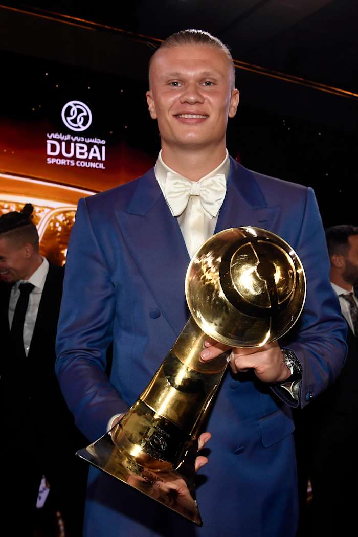 Erling Haaland pictured posing with his trophy after winning the Best Men's Player prize at the 2023 Globe Soccer Awards in Dubai