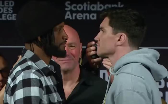 Neil Magny and Mike Malott stare down before their UFC 297 fight.