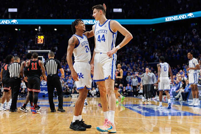 Jan 20, 2024; Lexington, Kentucky, USA; Kentucky Wildcats guard D.J. Wagner (21) congratulates forward Zvonimir Ivisic (44) during the first half against the Georgia Bulldogs at Rupp Arena at Central Bank Center. Mandatory Credit: Jordan Prather-USA TODAY Sports