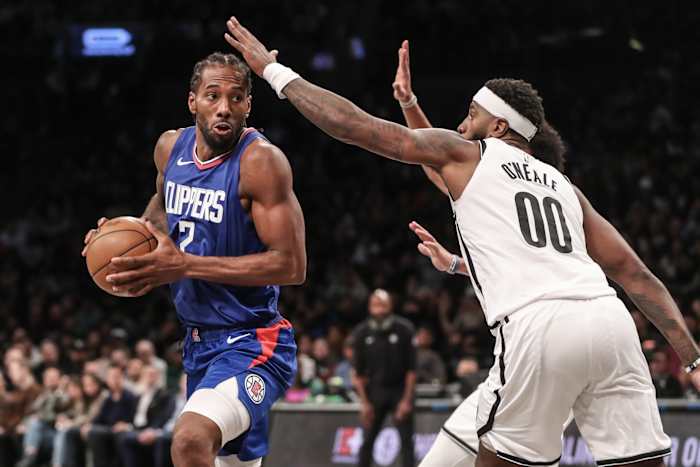 LA Clippers forward Kawhi Leonard (2) looks to drive past Brooklyn Nets forward Royce O'Neale (00)