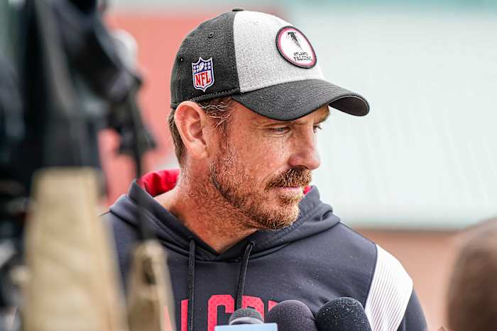 Atlanta Falcons defensive coordinator Ryan Nielsen answers questions for the media during minicamp