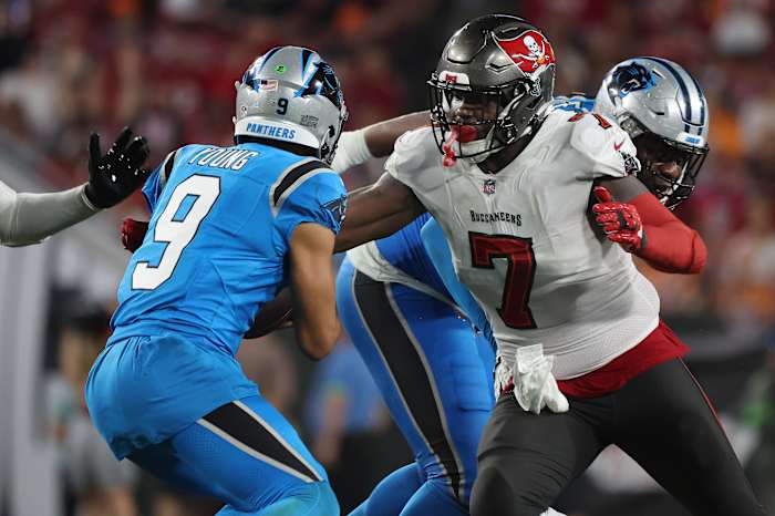 Dec 3, 2023; Tampa, Florida, USA; Tampa Bay Buccaneers linebacker Shaquil Barrett (7) rushes Carolina Panthers quarterback Bryce Young (9) during the second half at Raymond James Stadium. Mandatory Credit: Kim Klement Neitzel-USA TODAY Sports