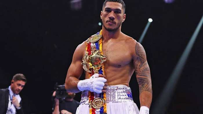 Jai Opetaia celebrates victory with the belt following the Cruiserweight fight between him and Ellis Zoro during the Day of Reckoning. Jai Opetaia left the WBC heavyweight champion Tyson Fury's camp. RICHARD PELHAM/GETTY IMAGES.