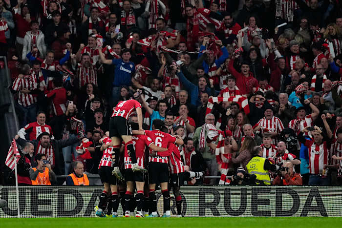 Players and fans of Athletic Bilbao pictured celebrating during a 4-2 win over Barcelona in the quarter-finals of the Copa del Rey in January 2024