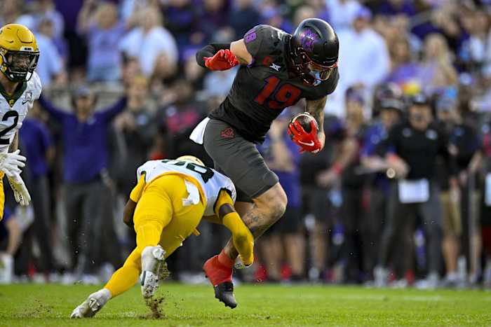 Nov 18, 2023; Fort Worth, Texas, USA; TCU Horned Frogs tight end Jared Wiley (19) catches a pass for a first down against the Baylor Bears during the second half at Amon G. Carter Stadium. Mandatory Credit: Jerome Miron-USA TODAY Sports