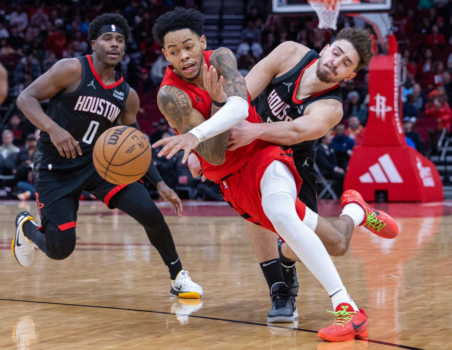 Trail Blazers guard Anfernee Simons (1) dribbles against Houston Rockets center Alperen Sengun (28) in the fourth quarter at Toyota Center.