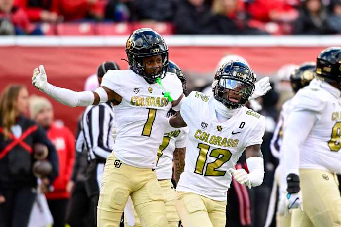 Nov 25, 2023; Salt Lake City, Utah, USA; Colorado Buffaloes athlete Travis Hunter (12) and cornerback Cormani McClain (1) react after a call against the Utah Utes at Rice-Eccles Stadium