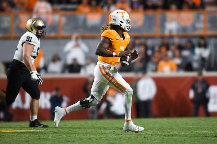 Tennessee quarterback Joe Milton III (7) runs with the ball during the NCAA college football game against Vanderbilt on Saturday, November 25, 2023 in Knoxville, Tenn.