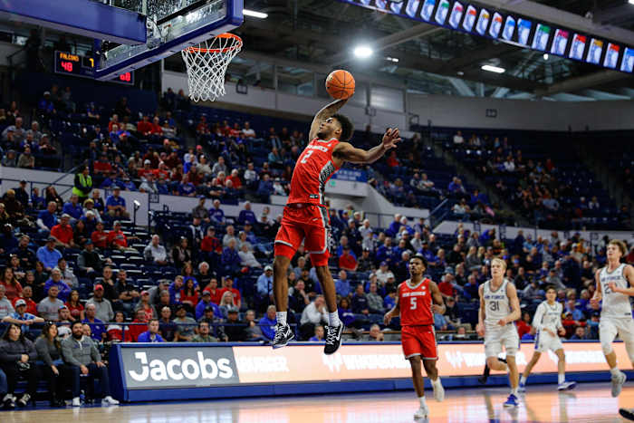 Jan 20, 2024; Colorado Springs, Colorado, USA; New Mexico Lobos guard Donovan Dent (2) dunks the ball in the second half against the Air Force Falcons at Clune Arena.
