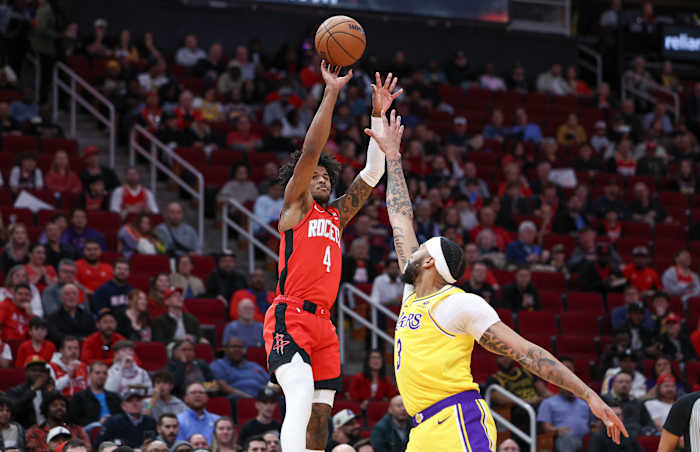 Rockets guard Jalen Green (4) shoots the ball as Los Angeles Lakers forward Anthony Davis (3) defends during the first quarter at Toyota Center.