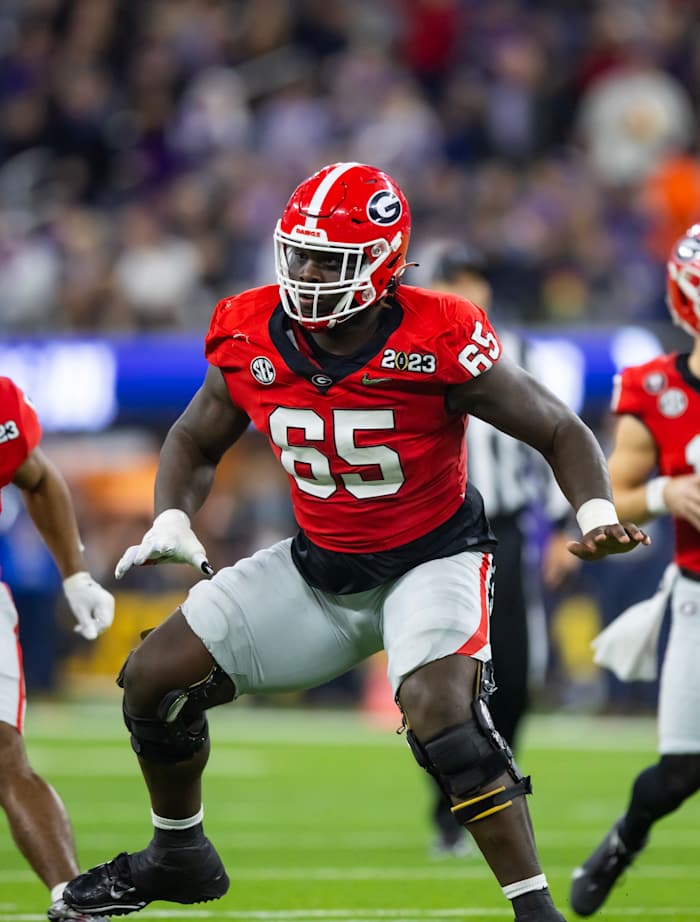 Jan 9, 2023; Inglewood, CA, USA; Georgia Bulldogs offensive lineman Amarius Mims (65) against the TCU Horned Frogs during the CFP national championship game at SoFi Stadium. Mandatory Credit: Mark J. Rebilas-USA TODAY Sports