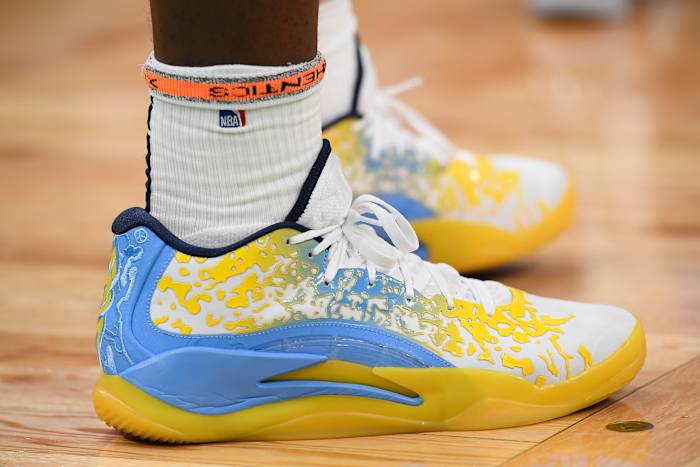 New Orleans Pelicans forward Zion Williamson's yellow and blue Jordan Brand sneakers.