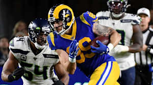 Dec 8, 2019; Los Angeles, CA, USA; Los Angeles Rams tight end Tyler Higbee (89) runs with the ball against Seattle Seahawks middle linebacker Bobby Wagner (54) in the second half of a NFL game at Los Angeles Memorial Coliseum. Mandatory Credit: Richard Mackson-USA TODAY Sports