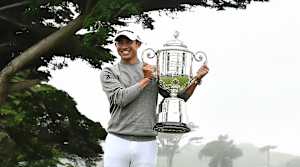 Collin Morikawa poses with the Wanamaker Trophy after winning the 2020 PGA Championship golf tournament at TPC Harding Park.