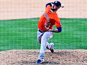 Oct 5, 2020; Los Angeles, California, USA; Houston Astros relief pitcher Ryan Pressly (55) in the ninth inning of game one of the 2020 ALDS against the Oakland Athletics at Dodger Stadium.