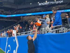 Defensive Coordinator Lou Anarumo stopped to sign a few autographs before Sunday's blowout win over the Lions.