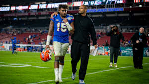 Florida LB Derek Wingo and former Gators assistant coach Christian Robinson.