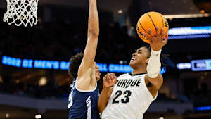 New Gators forward EJ Jarvis contests former Purdue guard Jaden Ivey during last season's NCAA Tournament. He accounted for eight points, two rebounds, two assists and two blocks in his lone tournament appearance, showcasing the promise he displayed during his senior year at Yale.