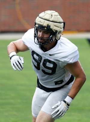 Purdue Boilermakers defensive end Jack Sullivan (99) runs a drill during practice, Friday, Aug. 5, 2022, at Ross-Ade Stadium in West Lafayette, Ind.