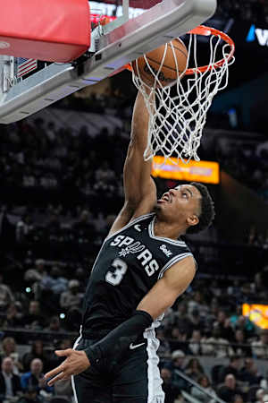 Jan 4, 2024; San Antonio, Texas, USA; San Antonio Spurs forward Keldon Johnson (3) dunks during the second half against the Milwaukee Bucks at Frost Bank Center.