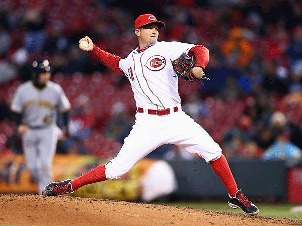 Mike Leake turned in a strong effort on the hill and contributed an unlikely two-run homer. (Andy Lyons/Getty Images)
