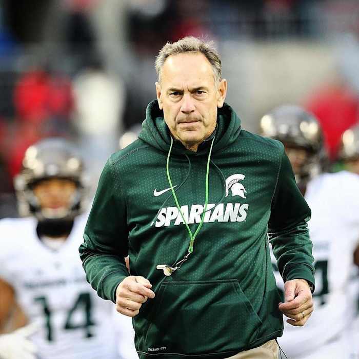 Mark Dantonio takes the field at OSU 2015.  Photo courtesy of Rey Del Rio and the MSU SID