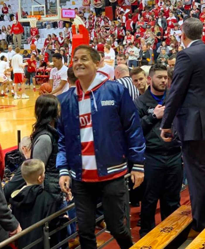 Mark Cuban heads to his seats at center court by the Indiana bench. 