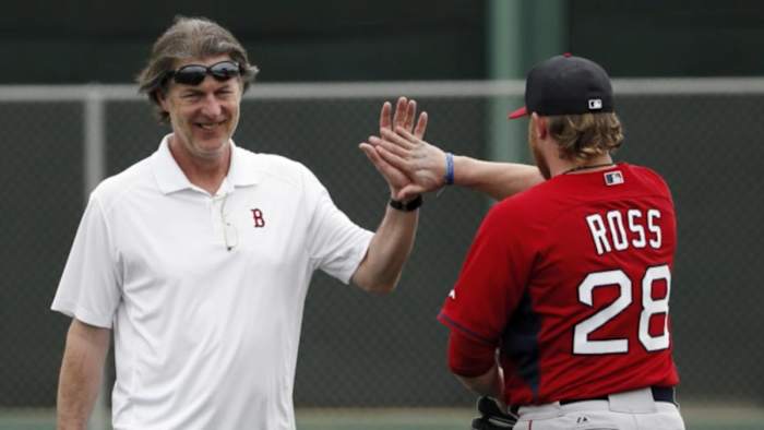 Boston Red Sox mental skills coach Bob Tewksbury, left, greets starting pitcher Robbie Ross Jr.