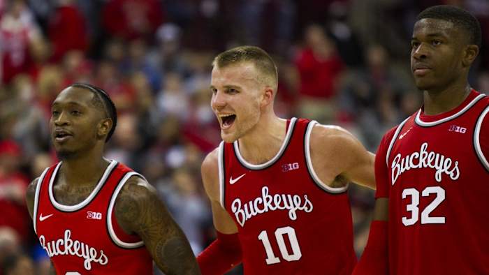 44. Cedric Russell, Justin Ahrens and E.J. Liddell