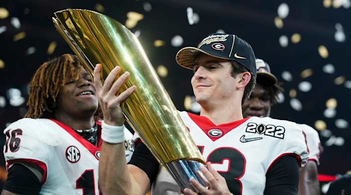 Georgia's Stetson Bennett celebrates after the College Football Playoff championship football game against Alabama Tuesday, Jan. 11, 2022, in Indianapolis. Georgia won 33-18.