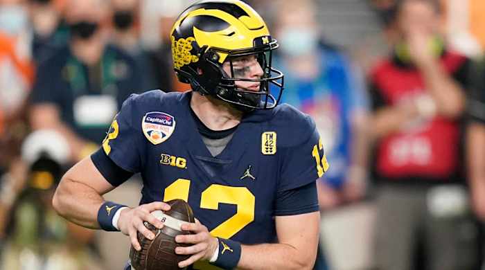 Michigan quarterback Cade McNamara looks to pass against Georgia during the first half of the Orange Bowl NCAA College Football Playoff semifinal game, Friday, Dec. 31, 2021, in Miami Gardens, Fla.